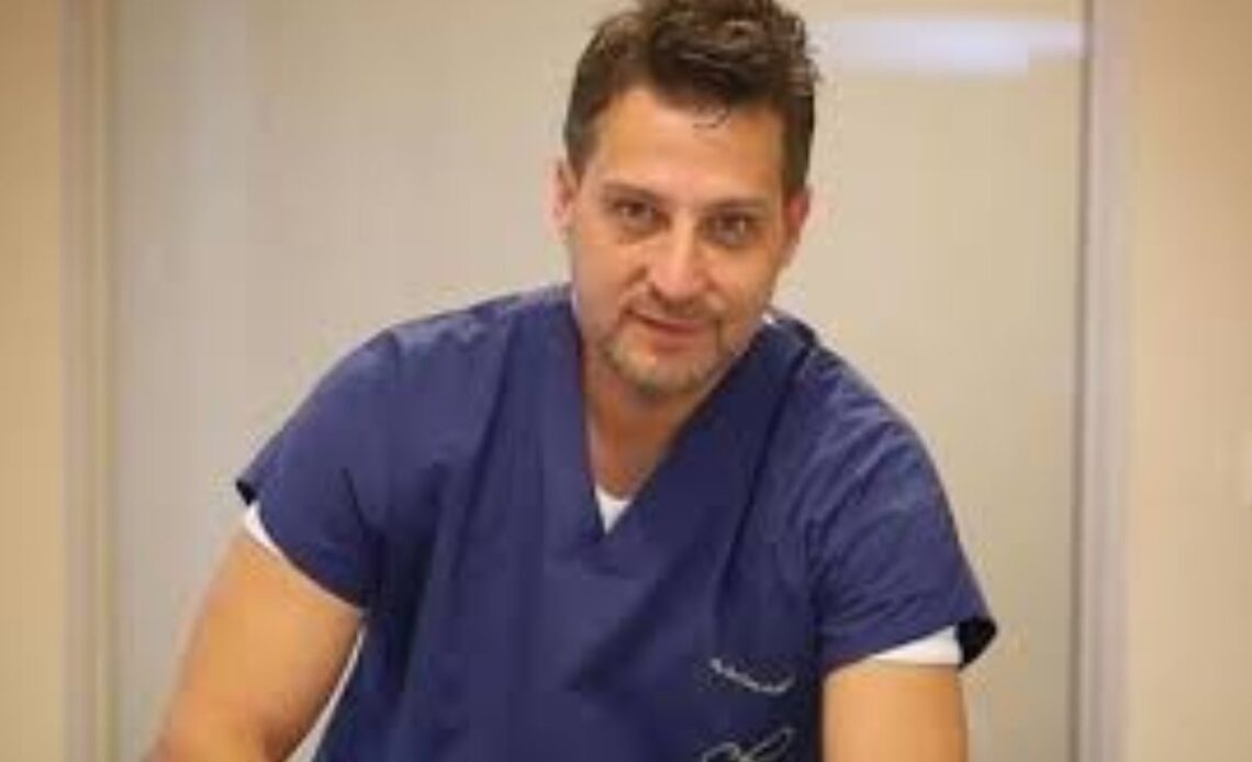 Dr Cem Karas